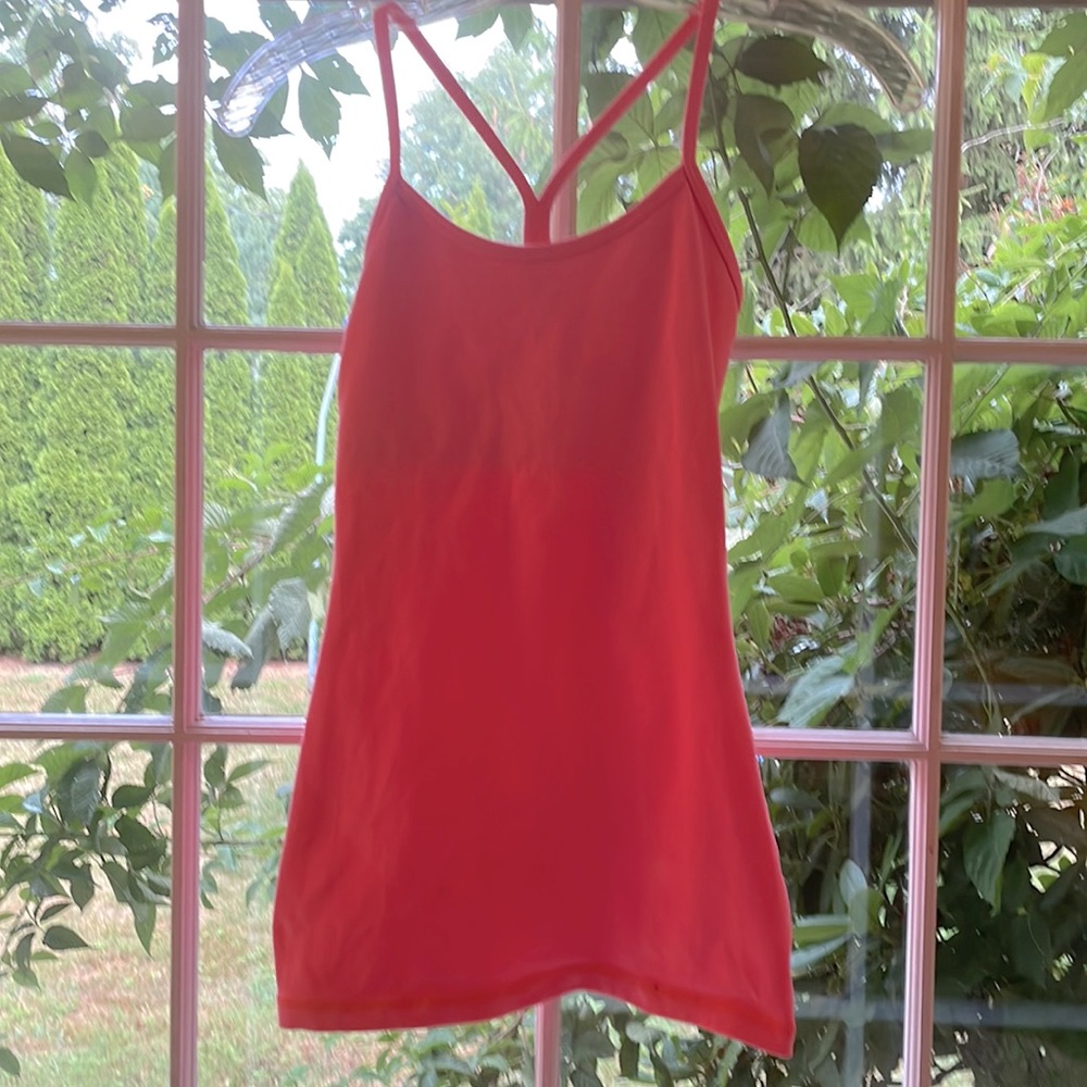 Lululemon bright coral yoga top.